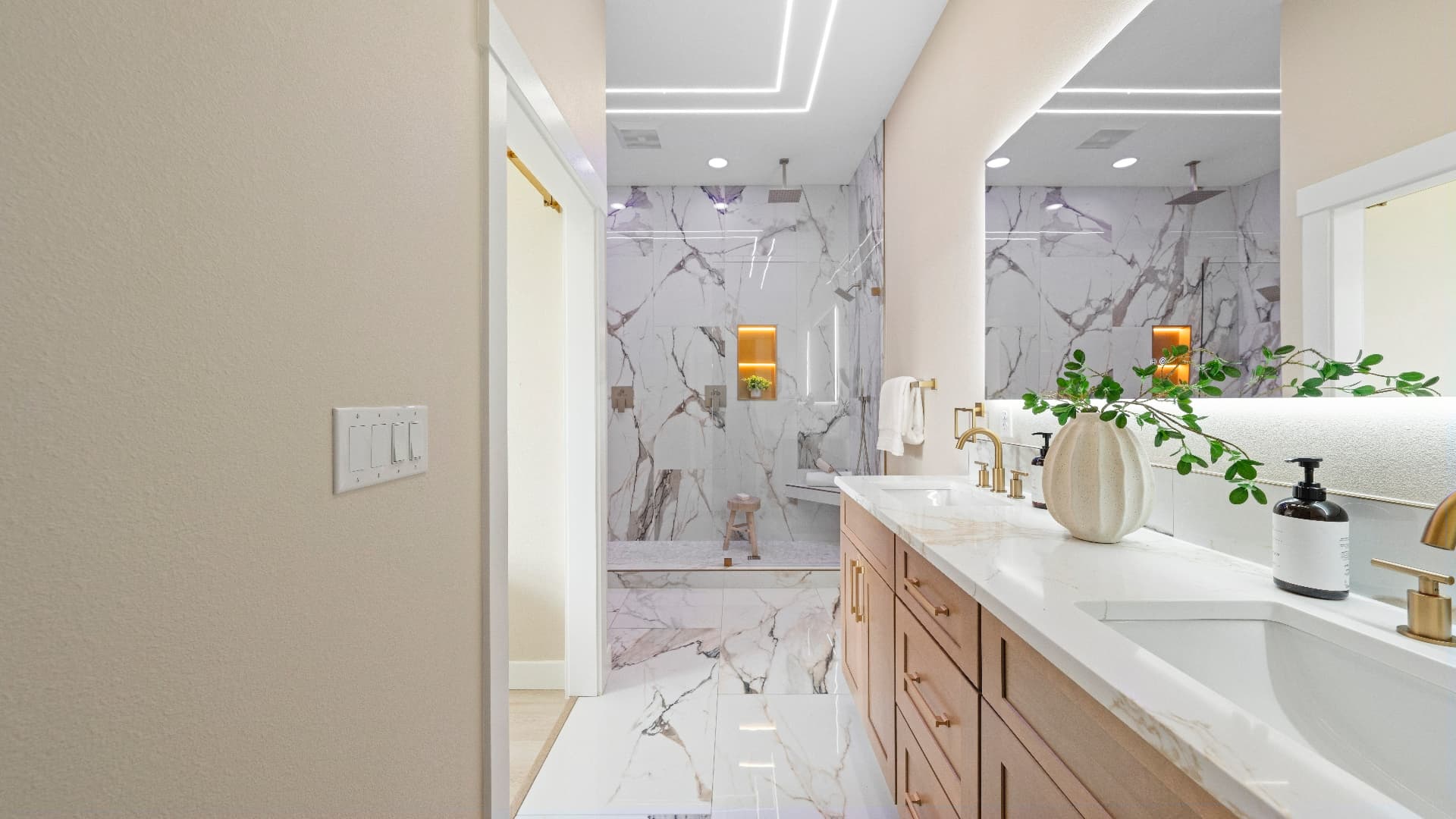 Primary bathroom vanity and shower at 1022 Rd 64