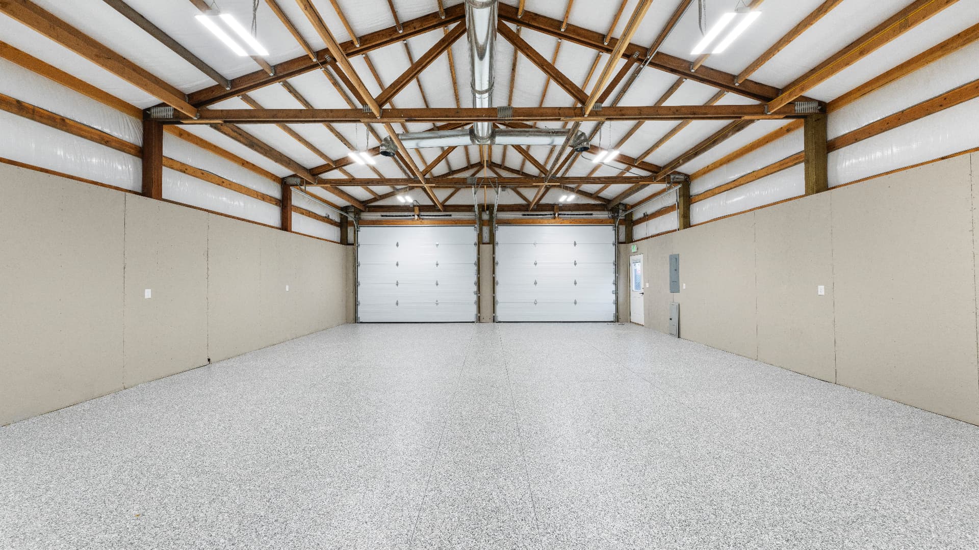 1116 E Clark St — Shop interior toward overhead doors