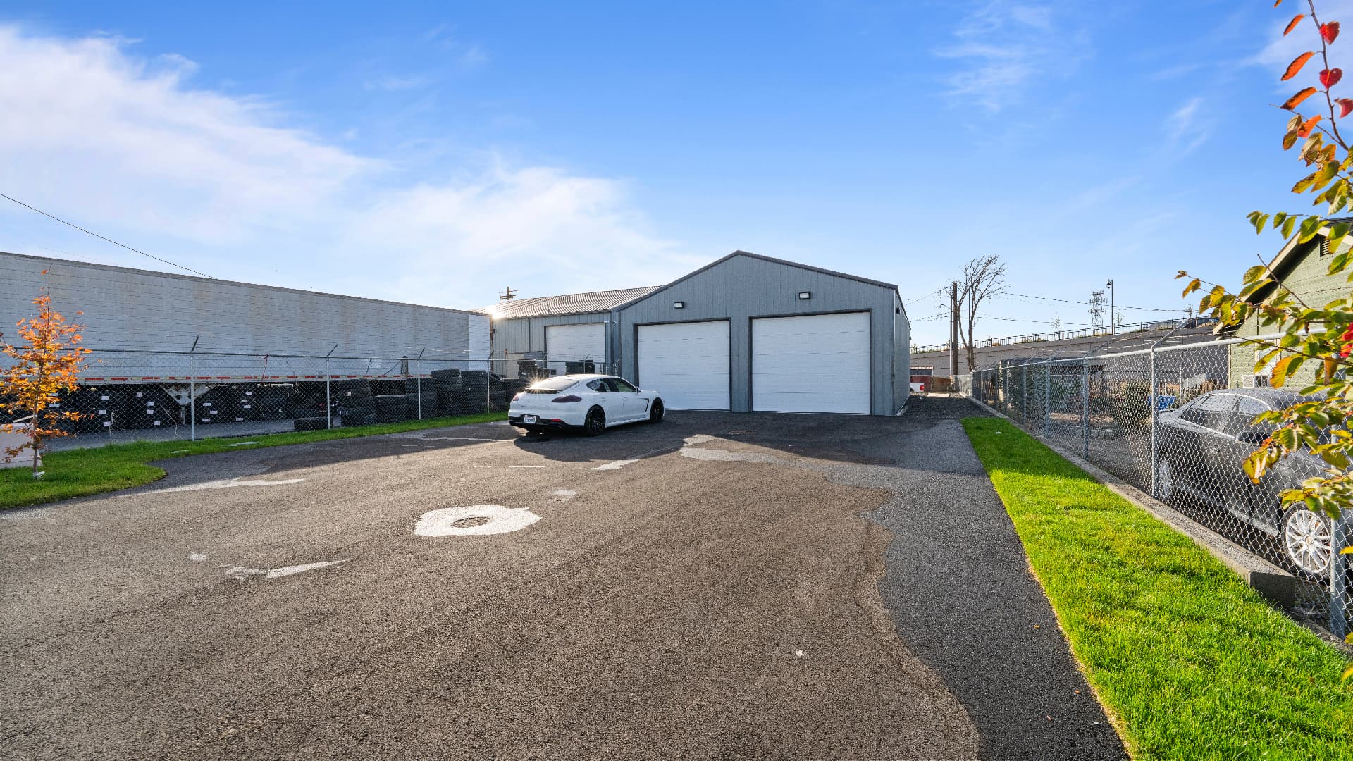1116 E Clark St — Front approach and paved parking